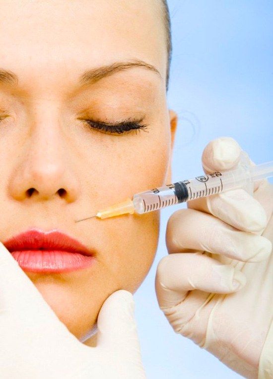 A woman gets botox injections