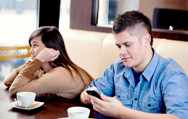 Woman looks irritated on a bad first date