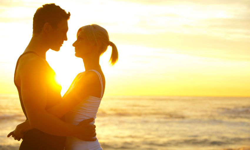 Couple at sunset on the beach