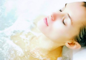 woman in bathtub improving sex life