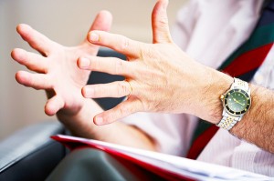 Hands demonstrating communicating and giving feedback between partners