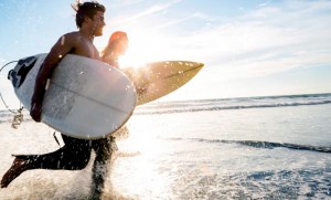 couple takes surfing lesson for a date