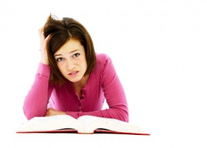 Frustrated woman looks at the love rule book